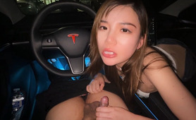 Asian babe NicoLove sucks a small cock in a Tesla car