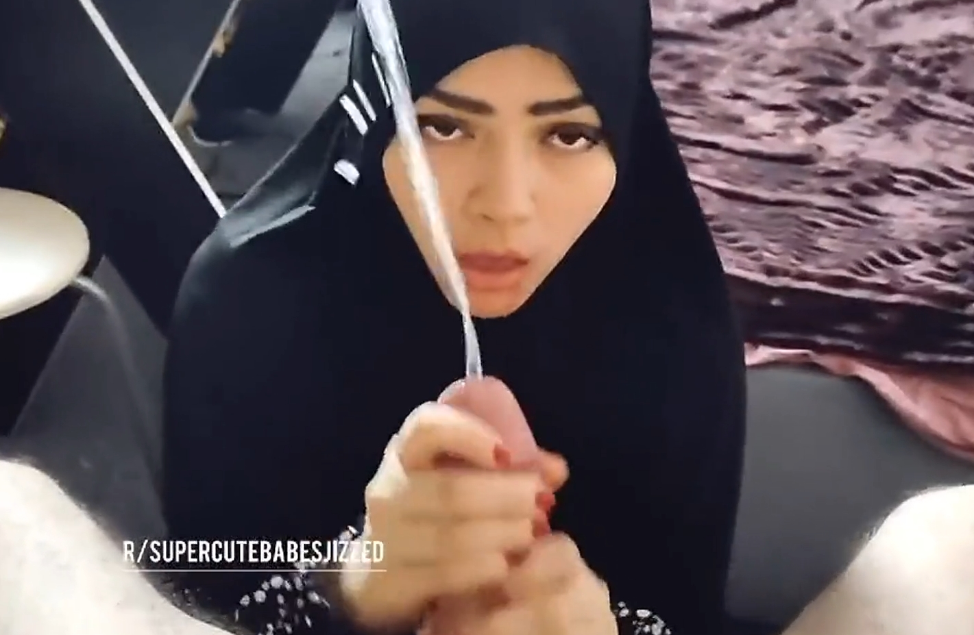 Muslim girl in hijab gives handjob